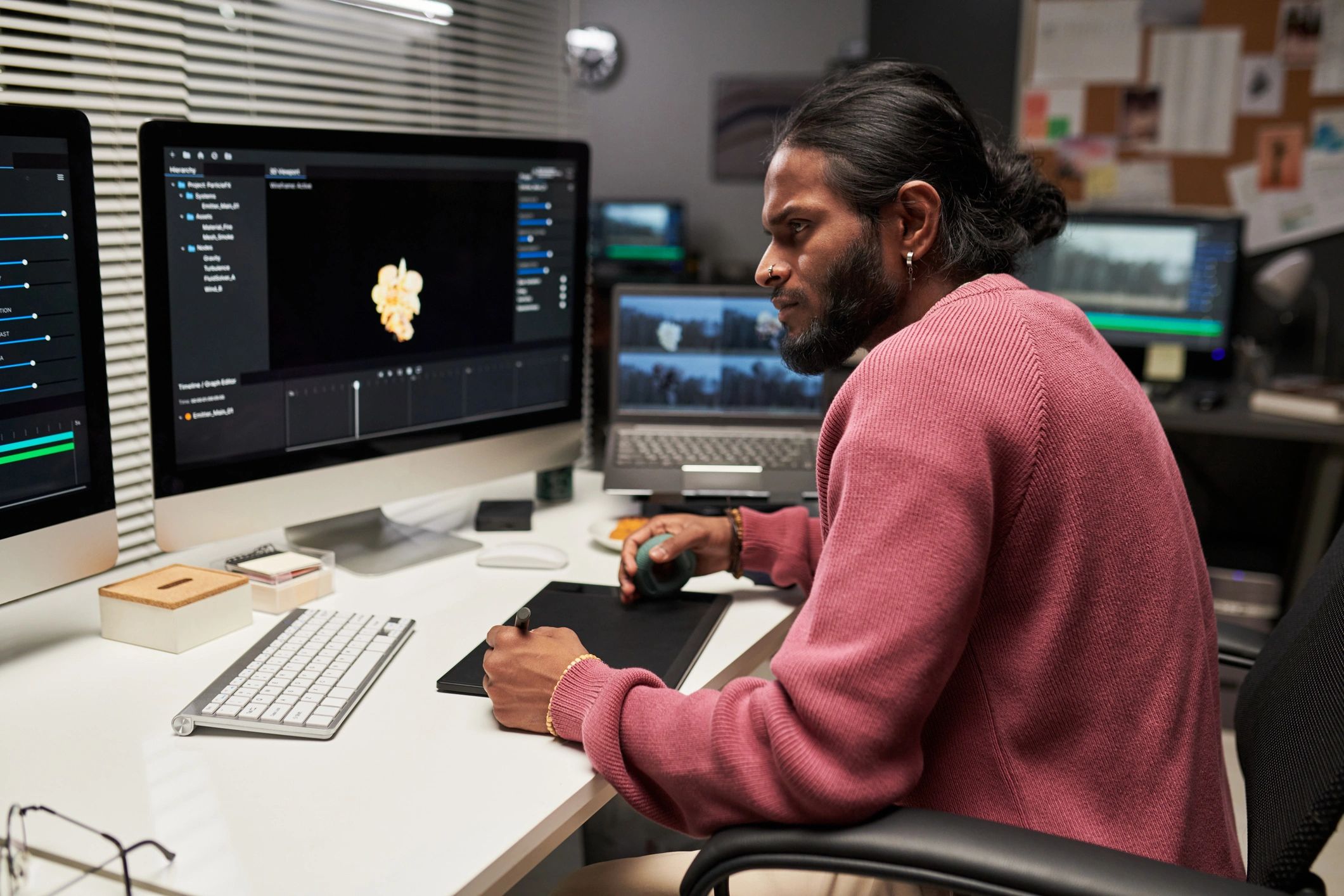 Creator editing video clips at a desktop workstation